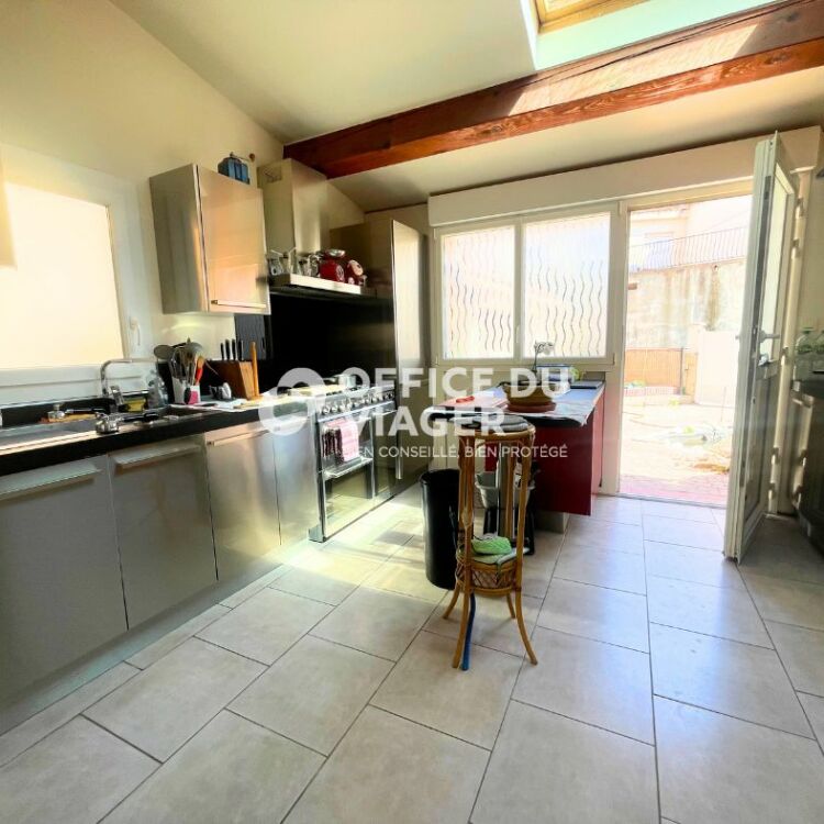 Maison divisée en 2 appartements - 153 m²