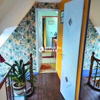 Ensemble immobilier - 1 appartement + 1 local commercial - 126,10 m²