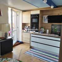 Ensemble immobilier - 1 appartement + 1 local commercial - 126,10 m²